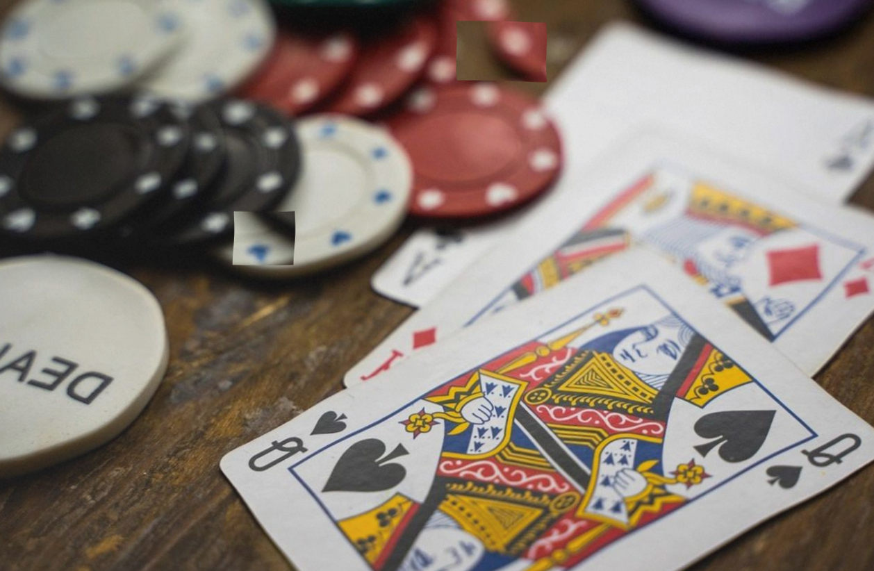 Fresh felt and stacked chips on a poker table before doors